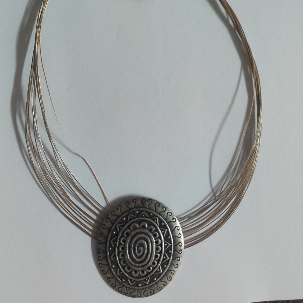 Vintage necklace with silver-tone pendant "Wiry big sun"